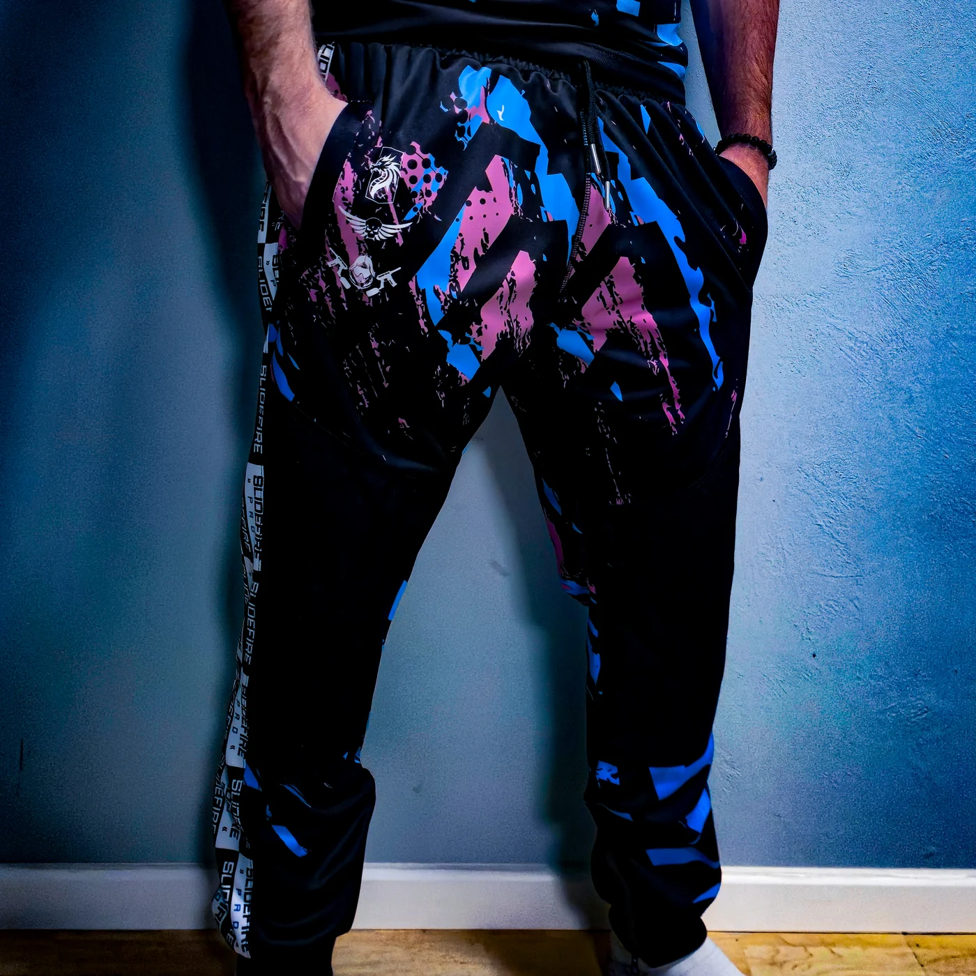 Front of custom blue and pink SlideFirePro jogger pants
